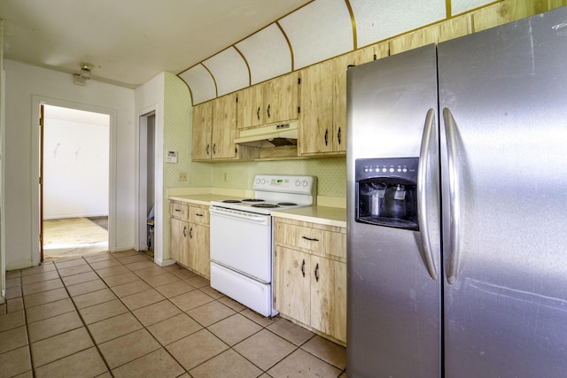 kitchen featuring stainless steel refrigerator with ice dispenser, white electric range, under cabinet range hood, light countertops, and light brown cabinetry