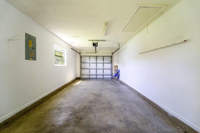 garage featuring electric panel and a garage door opener