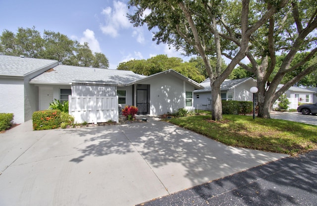 18541 Cherborg Dr Unit D, Boca Raton, FL 33496 - ranch-style home with stucco siding and a shingled roof