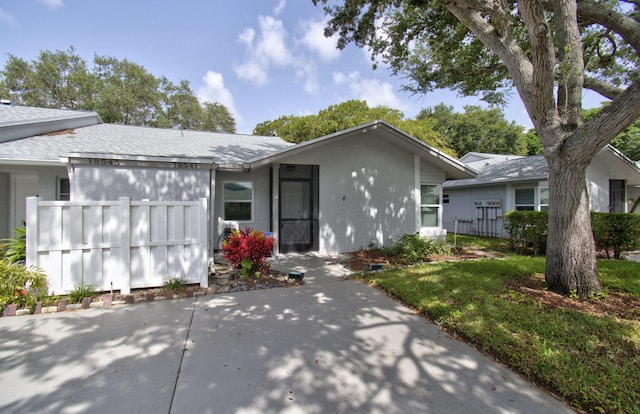 18541 Cherborg Dr Unit D, Boca Raton, FL 33496 - ranch-style home with a shingled roof