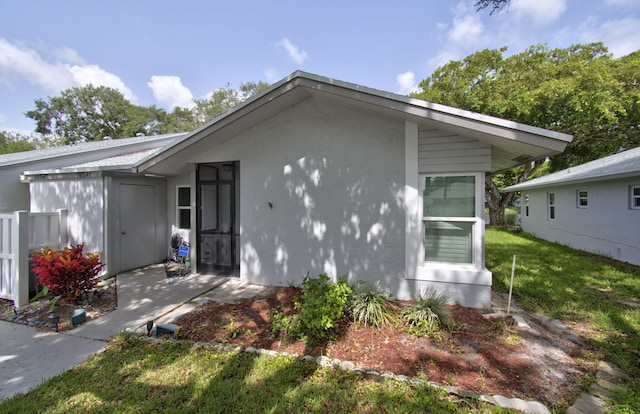 18541 Cherborg Dr Unit D, Boca Raton, FL 33496 - view of front of property featuring stucco siding and a front yard