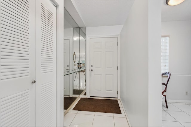 18541 Cherborg Dr Unit D, Boca Raton, FL 33496 - foyer featuring light tile patterned floors