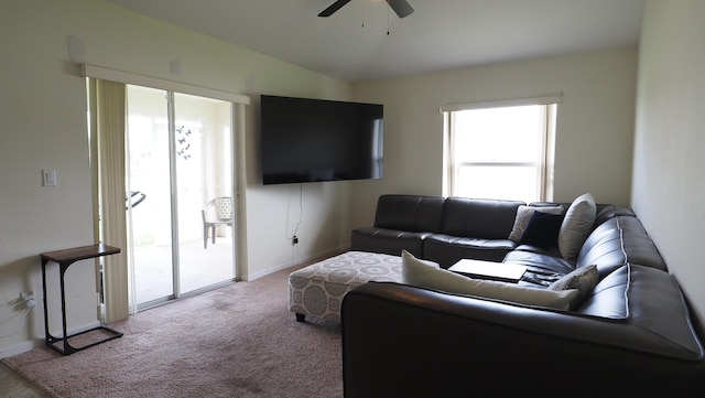 5705 NW Crocus Ave, Port Saint Lucie, FL 34986 - carpeted living room featuring ceiling fan and vaulted ceiling