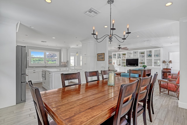 219 Claremont Ln, Palm Beach Shores, FL 33404 - dining room featuring a chandelier, recessed lighting, ceiling fan, and light wood-style flooring