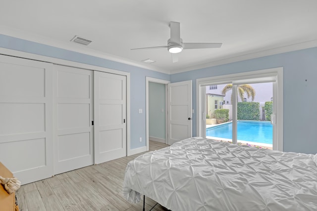 219 Claremont Ln, Palm Beach Shores, FL 33404 - bedroom featuring access to outside, light wood finished floors, a closet, a ceiling fan, and ornamental molding