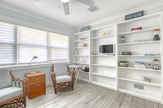 219 Claremont Ln, Palm Beach Shores, FL 33404 - living area with a ceiling fan and wood finished floors
