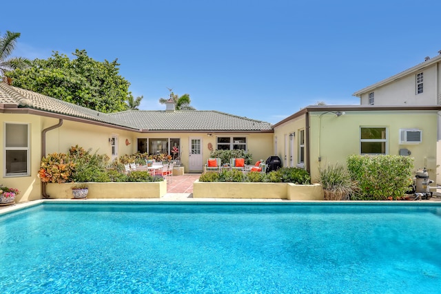 219 Claremont Ln, Palm Beach Shores, FL 33404 - outdoor pool featuring a patio