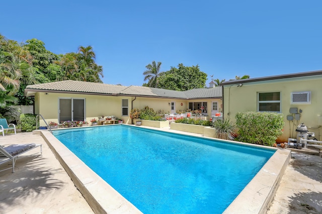 219 Claremont Ln, Palm Beach Shores, FL 33404 - swimming pool with a patio
