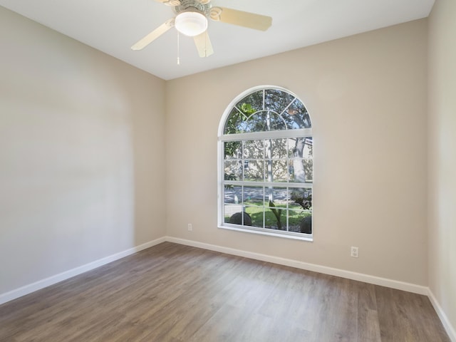 5412 NW 57th Way, Coral Springs, FL 33067 - unfurnished room featuring plenty of natural light, wood finished floors, and a ceiling fan