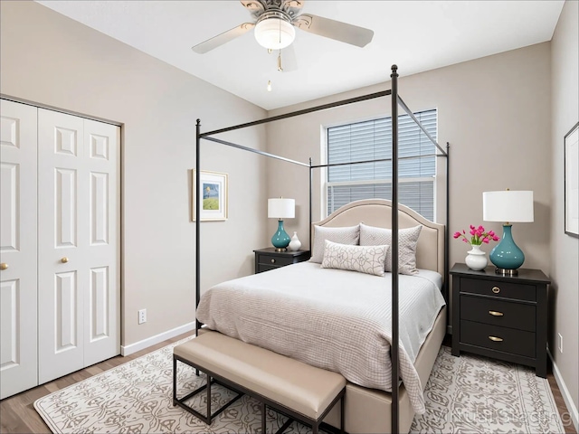 5412 NW 57th Way, Coral Springs, FL 33067 - bedroom with a closet, light wood finished floors, and a ceiling fan
