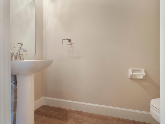 5412 NW 57th Way, Coral Springs, FL 33067 - bathroom featuring wood finished floors and toilet