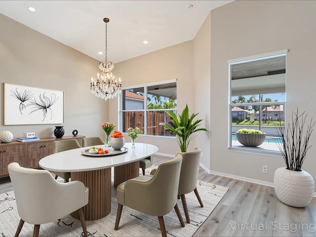 5412 NW 57th Way, Coral Springs, FL 33067 - dining room featuring a chandelier, healthy amount of natural light, light wood-style floors, and recessed lighting