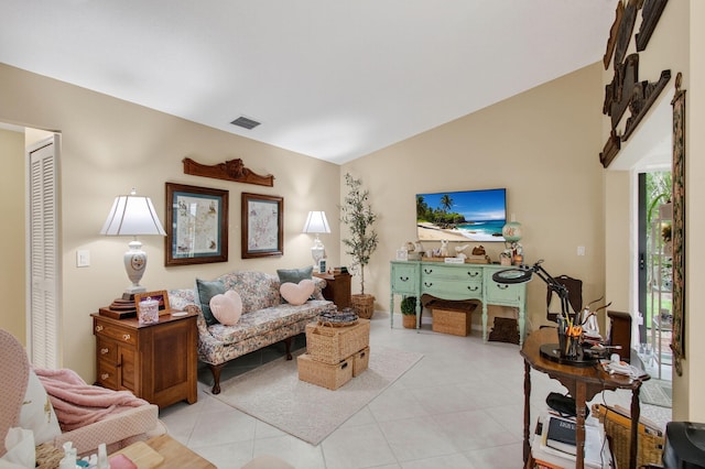 5707 Parkwalk Cir E, Boynton Beach, FL 33472 - living room featuring light tile patterned floors and lofted ceiling