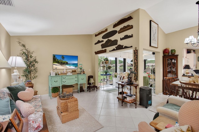 5707 Parkwalk Cir E, Boynton Beach, FL 33472 - living area with a chandelier, light tile patterned floors, and high vaulted ceiling