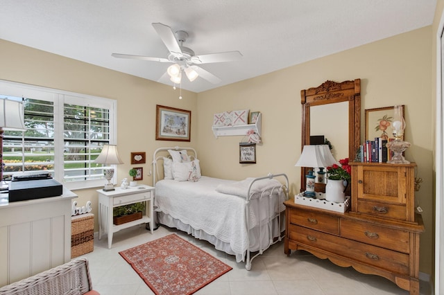 5707 Parkwalk Cir E, Boynton Beach, FL 33472 - bedroom with light tile patterned floors and a ceiling fan