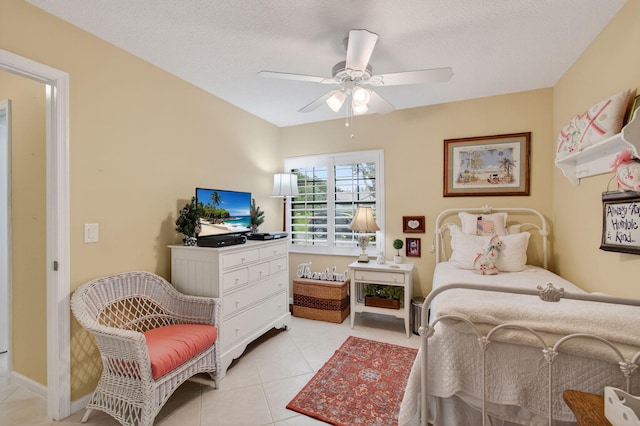 5707 Parkwalk Cir E, Boynton Beach, FL 33472 - bedroom featuring light tile patterned floors, a ceiling fan, and a textured ceiling
