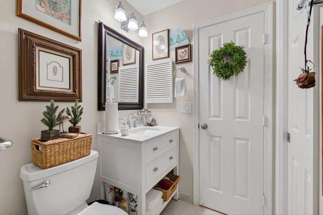 5707 Parkwalk Cir E, Boynton Beach, FL 33472 - half bathroom featuring vanity and tile patterned flooring
