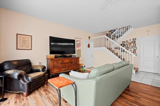 11 Live Oak Cir Unit 11, Tequesta, FL 33469 - living room with stairway and wood finished floors
