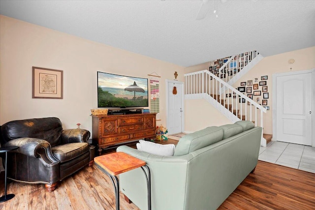 11 Live Oak Cir Unit 11, Tequesta, FL 33469 - living area featuring wood finished floors and stairs