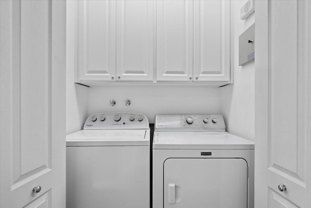 11 Live Oak Cir Unit 11, Tequesta, FL 33469 - laundry area with independent washer and dryer and cabinet space