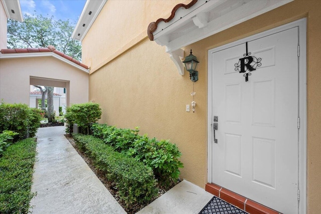 11 Live Oak Cir Unit 11, Tequesta, FL 33469 - property entrance featuring stucco siding