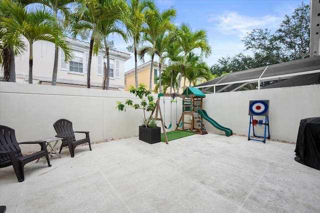 11 Live Oak Cir Unit 11, Tequesta, FL 33469 - view of patio featuring a playground