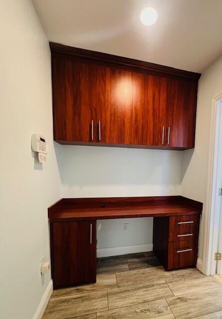 1120 99th St Unit 301, Bay Harbor Islands, FL 33154 - unfurnished office with built in desk and light wood-style flooring