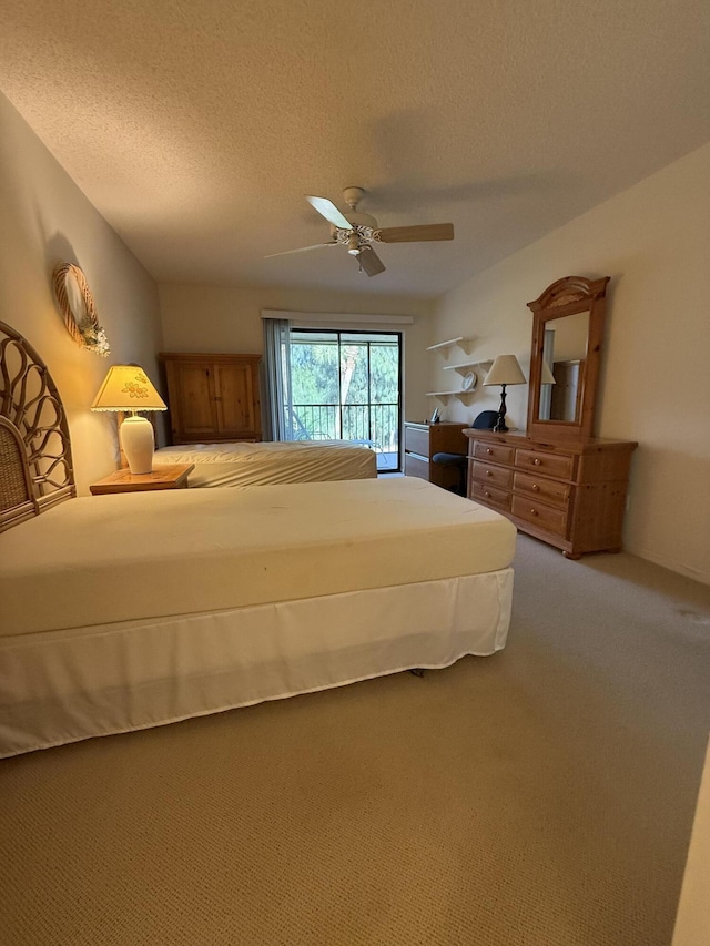 1142 Keystone Dr Unit C, Jupiter, FL 33458 - carpeted bedroom with a textured ceiling and a ceiling fan