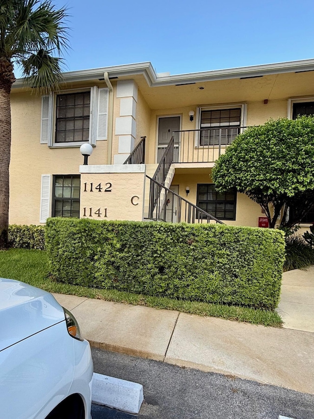 1142 Keystone Dr Unit C, Jupiter, FL 33458 - view of building exterior with stairway
