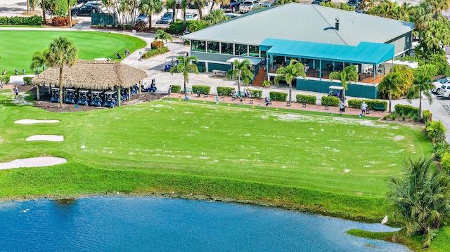 1142 Keystone Dr Unit C, Jupiter, FL 33458 - bird's eye view of a golf club and a nearby body of water