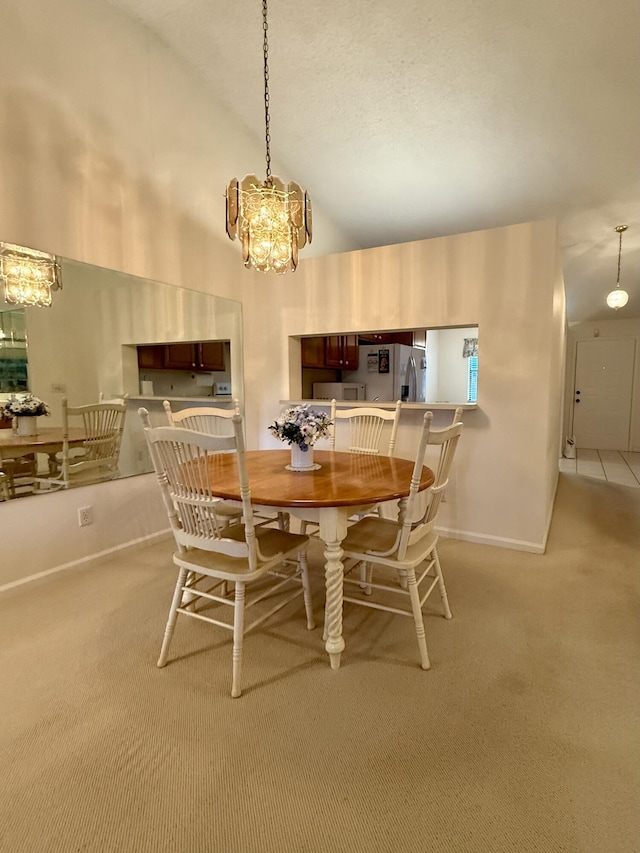 1142 Keystone Dr Unit C, Jupiter, FL 33458 - dining area featuring a chandelier, light carpet, and high vaulted ceiling