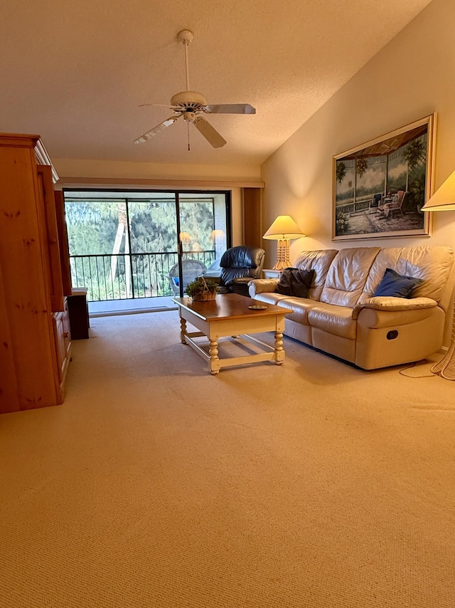 1142 Keystone Dr Unit C, Jupiter, FL 33458 - carpeted living area featuring a ceiling fan, lofted ceiling, and a textured ceiling