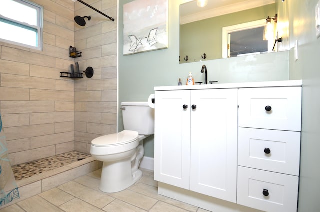5447 SE 51st Dr, Stuart, FL 34997 - full bathroom with crown molding, vanity, and tiled shower