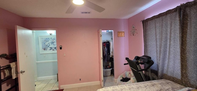 4732 Chariot Cir, Greenacres, FL 33463 - tiled bedroom featuring a spacious closet, a closet, and ceiling fan
