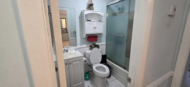 4732 Chariot Cir, Greenacres, FL 33463 - bathroom with vanity, tile patterned flooring, and bath / shower combo with glass door