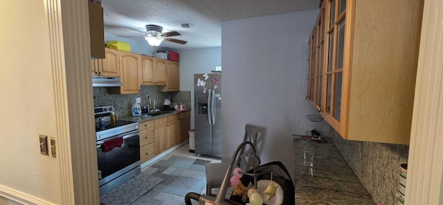 4732 Chariot Cir, Greenacres, FL 33463 - kitchen with stainless steel appliances, ceiling fan, decorative backsplash, under cabinet range hood, and light brown cabinets