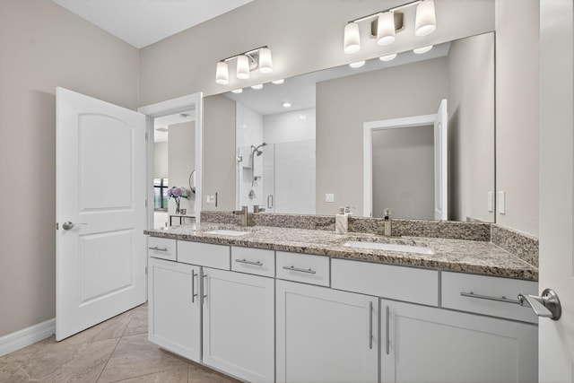 8343 Cinch Way, Lake Worth, FL 33467 - bathroom with double vanity and a stall shower