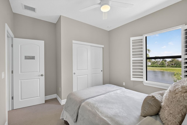 8343 Cinch Way, Lake Worth, FL 33467 - bedroom with carpet, a closet, and a ceiling fan