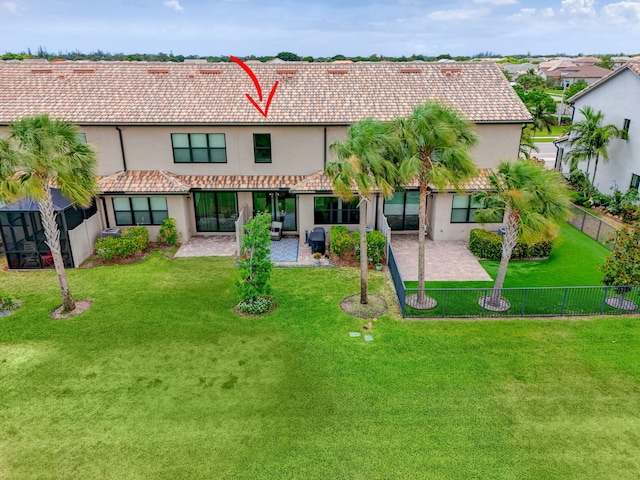 8343 Cinch Way, Lake Worth, FL 33467 - rear view of house with stucco siding, a fenced backyard, a patio, a tile roof, and a residential view