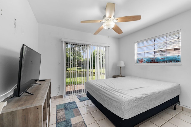 9890 W Heather Ln, Miramar, FL 33025 - bedroom featuring access to exterior, light tile patterned floors, and a ceiling fan