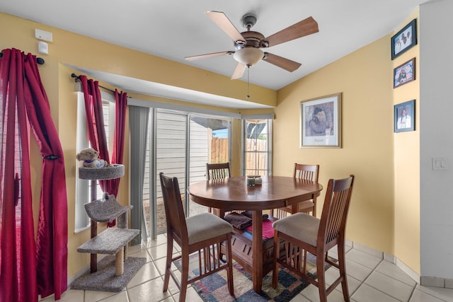 9890 W Heather Ln, Miramar, FL 33025 - dining area featuring light tile patterned floors, a ceiling fan, and vaulted ceiling