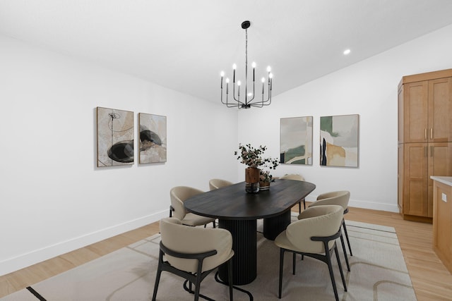 21436 Woodchuck Ln, Boca Raton, FL 33428 - dining area with a chandelier, light wood-style flooring, vaulted ceiling, and recessed lighting