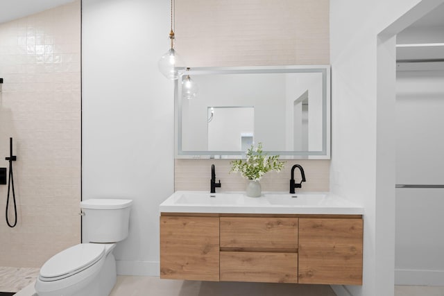 21436 Woodchuck Ln, Boca Raton, FL 33428 - full bathroom featuring double vanity, decorative backsplash, and a tile shower
