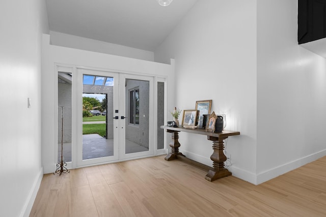 21436 Woodchuck Ln, Boca Raton, FL 33428 - foyer entrance featuring wood finished floors and french doors