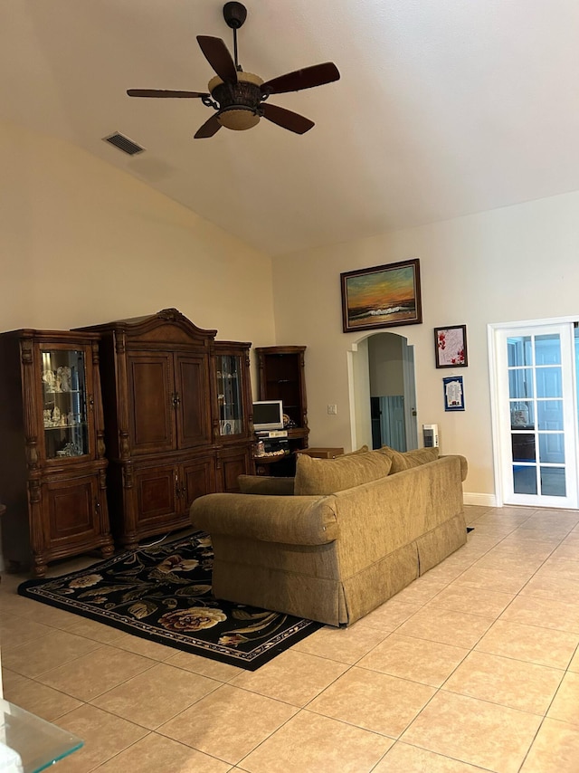 1701 SW Penrose Ave, Port Saint Lucie, FL 34953 - living room featuring ceiling fan, light tile patterned floors, and high vaulted ceiling