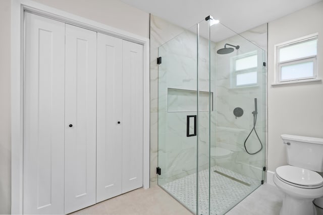 77 Fairview E, Tequesta, FL 33469 - full bath with a stall shower and tile patterned floors