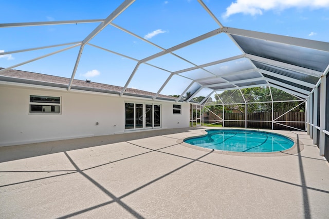 77 Fairview E, Tequesta, FL 33469 - view of pool with a patio area, a fenced backyard, and glass enclosure