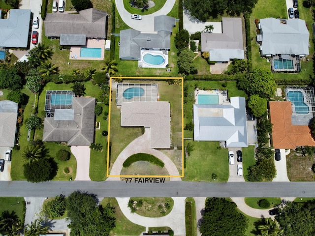 77 Fairview E, Tequesta, FL 33469 - aerial view of residential area featuring property boundaries highlighted and a pool area