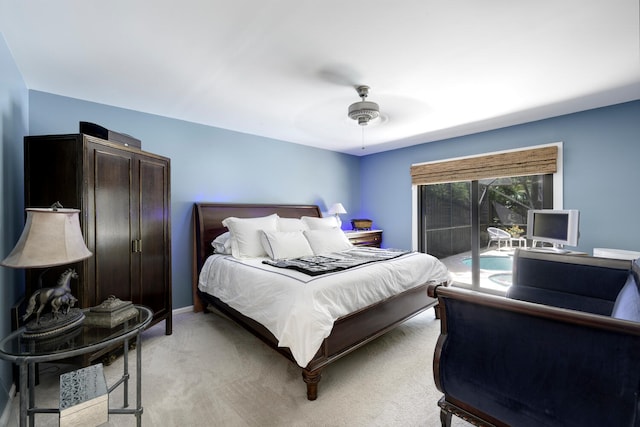 1085 Raintree Dr, Palm Beach Gardens, FL 33410 - bedroom featuring access to exterior, light colored carpet, and a ceiling fan