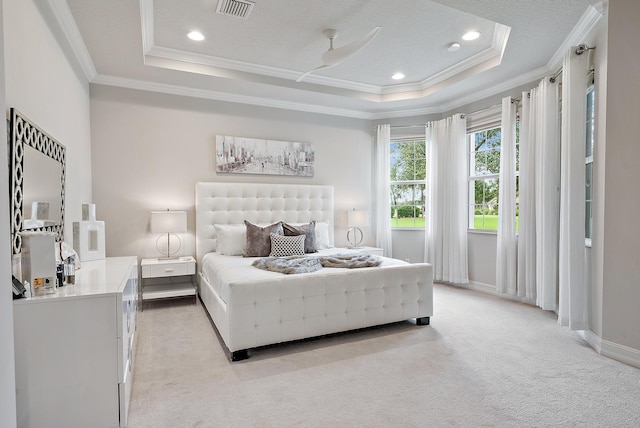 171 Tresana Blvd Unit 129, Jupiter, FL 33478 - bedroom with a tray ceiling, crown molding, light colored carpet, and recessed lighting